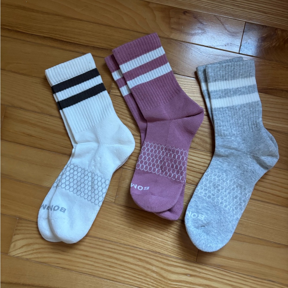 Bombas socks! 
Women’s medium Bombas brand Crew Socks - White, Pink, and Gray